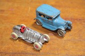 TWO CAST IRON AUTOMOBILES.  Am