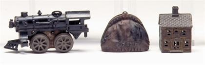 Two cast iron banks and cast iron