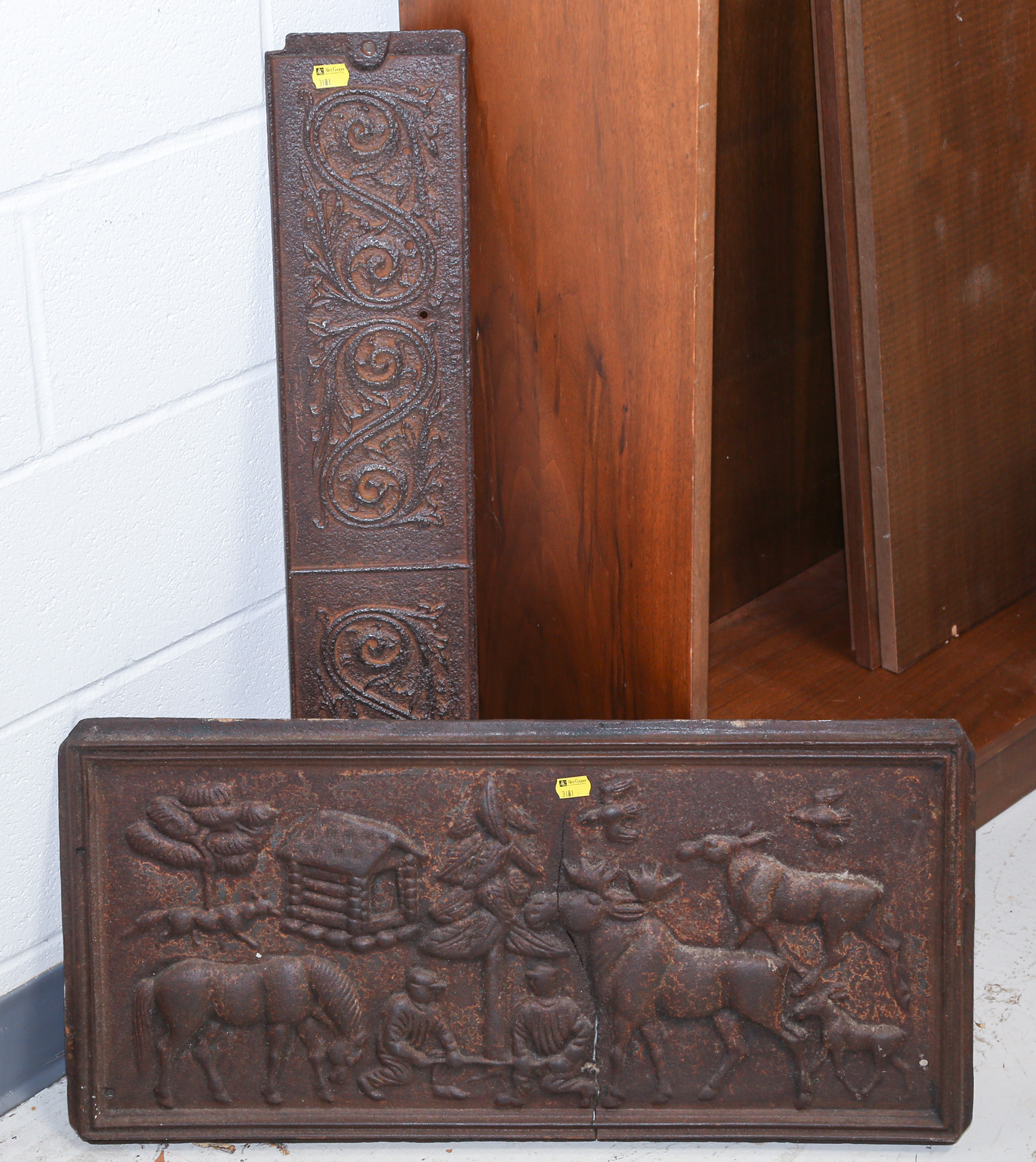 TWO CAST IRON DECORATIVE PANELS .