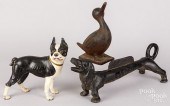 TWO CAST IRON DOORSTOPS, BOOTS