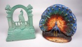TWO CAST IRON DOORSTOPS IN THE