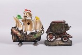TWO CAST IRON DOORSTOPS IN THE