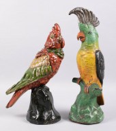 TWO CAST IRON DOORSTOPS IN THE
