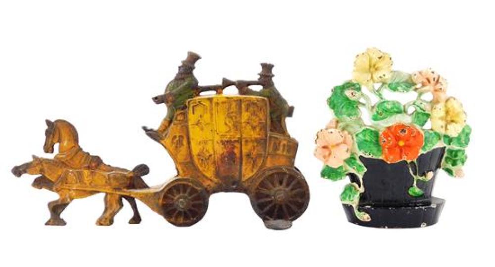TWO CAST IRON DOORSTOPS,