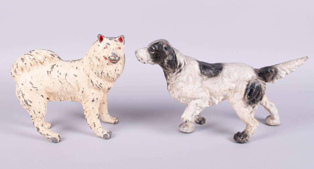 TWO CAST IRON DOORSTOPS OF A