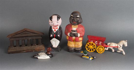 Two cast iron figural still banks