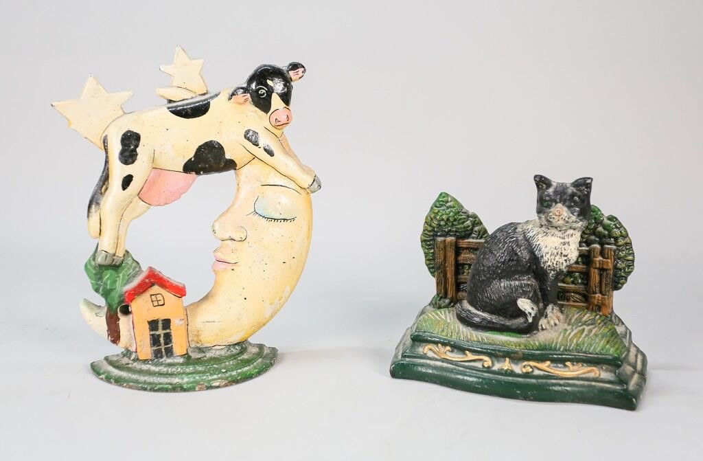 TWO CAST IRON FOLK ART DOOR
