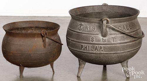 TWO CAST IRON FOOTED COOKING