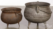 TWO CAST IRON FOOTED COOKING P