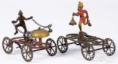 TWO CAST IRON GONG BELL TOYSTw