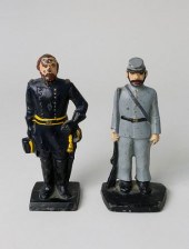 TWO CAST IRON PAINTED DOORSTOP