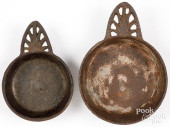 TWO CAST IRON PORRINGERS, CA.