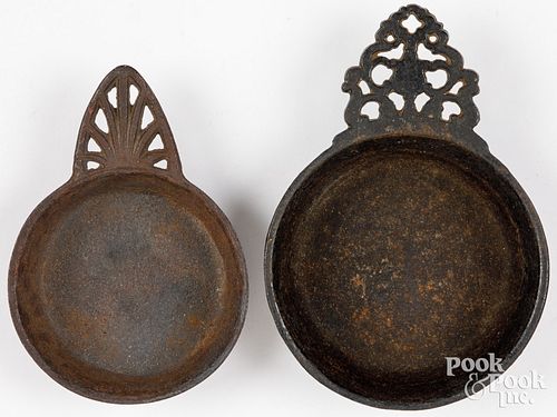 TWO CAST IRON PORRINGERS, CA.