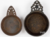 TWO CAST IRON PORRINGERS, CA.
