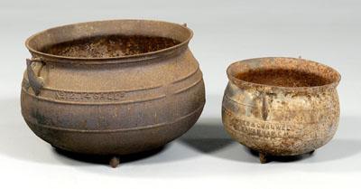 Two cast iron pots: both marked