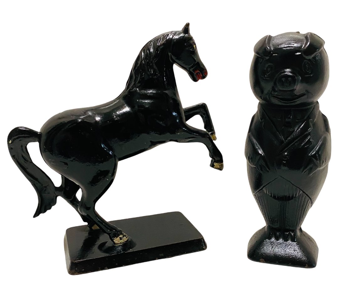 TWO CAST IRON STILL BANKS - REARING