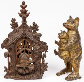 TWO CAST IRON STILL BANKS<br>T
