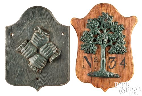 TWO CAST LEAD FIREMARKS MOUNTED