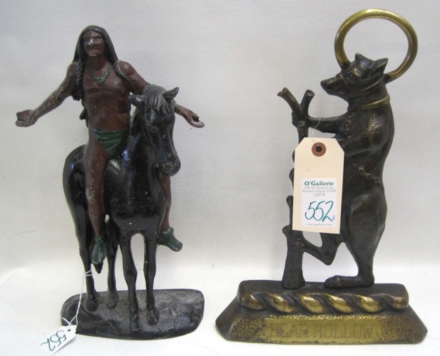TWO CAST METAL DOOR STOPS: (1)
