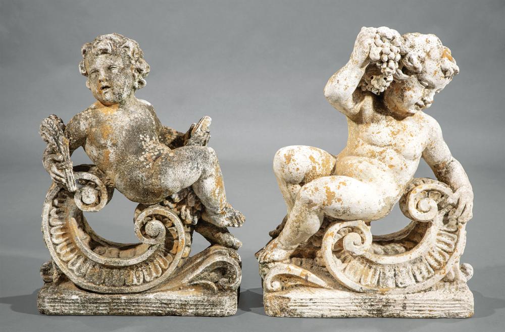 TWO CAST STONE FIGURES OF