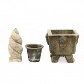 TWO CAST STONE GARDEN POTS AND