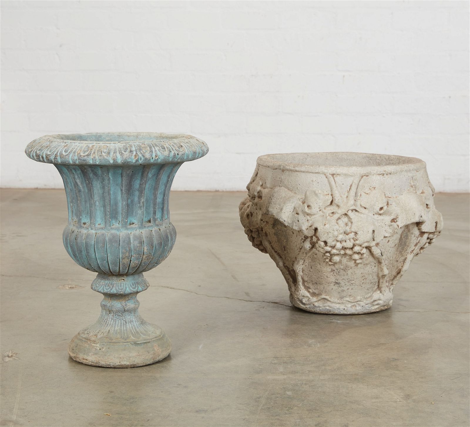 TWO CAST STONE GARDEN URNSTwo