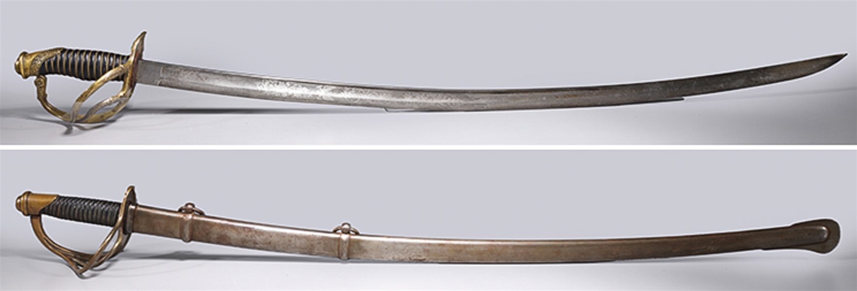 Two cavalry sabers, one blade