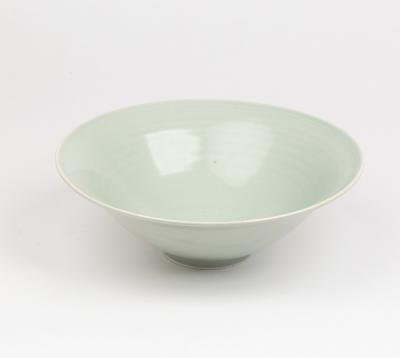 Two celadon glazed porcelain footed