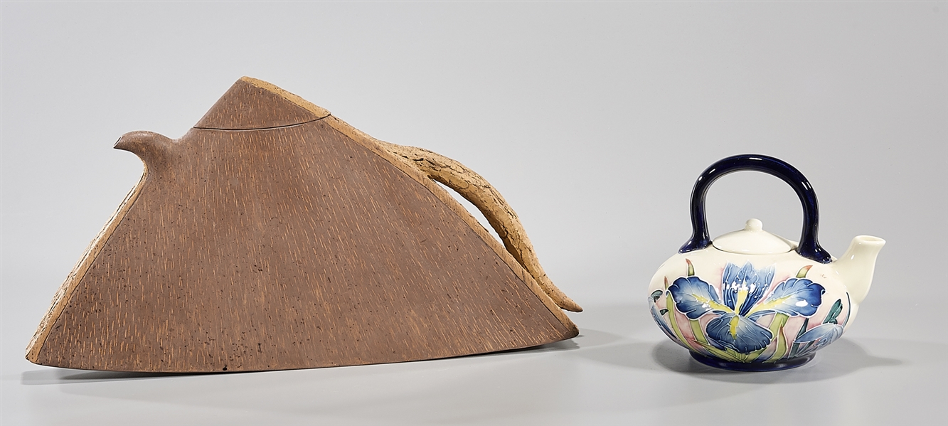 Two ceramic covered tea pots;