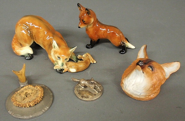 Two ceramic foxes tallest 5"h.