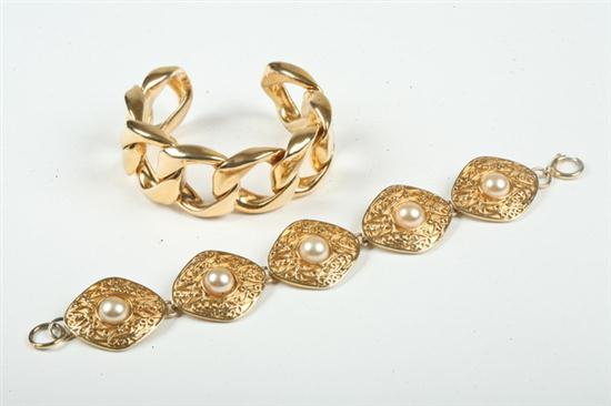 TWO CHANEL GOLD-TONE BRACELETS .