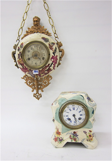 TWO CHINA CASED CLOCKS: A)
