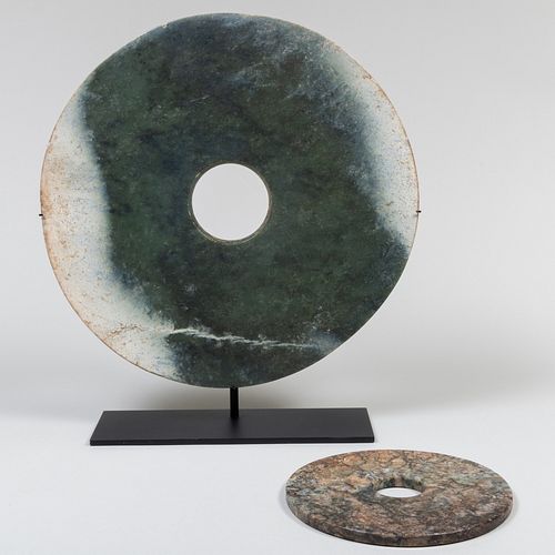 TWO CHINESE ARCHAISTIC HARDSTONE BI