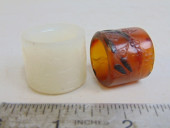 TWO CHINESE ARCHER RINGS, CARV