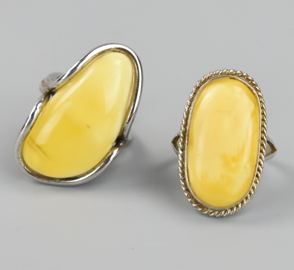 TWO CHINESE BEESWAX SLILVER RINGS