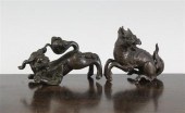 Two Chinese bronze scroll weig