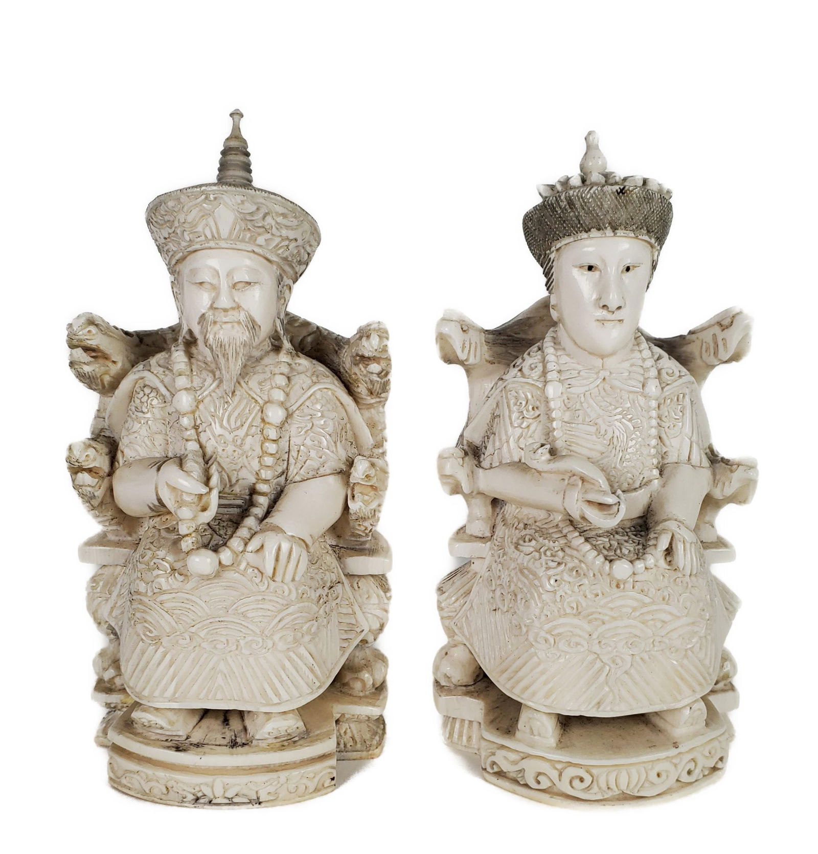 TWO CHINESE CARVED EMPERORS ON