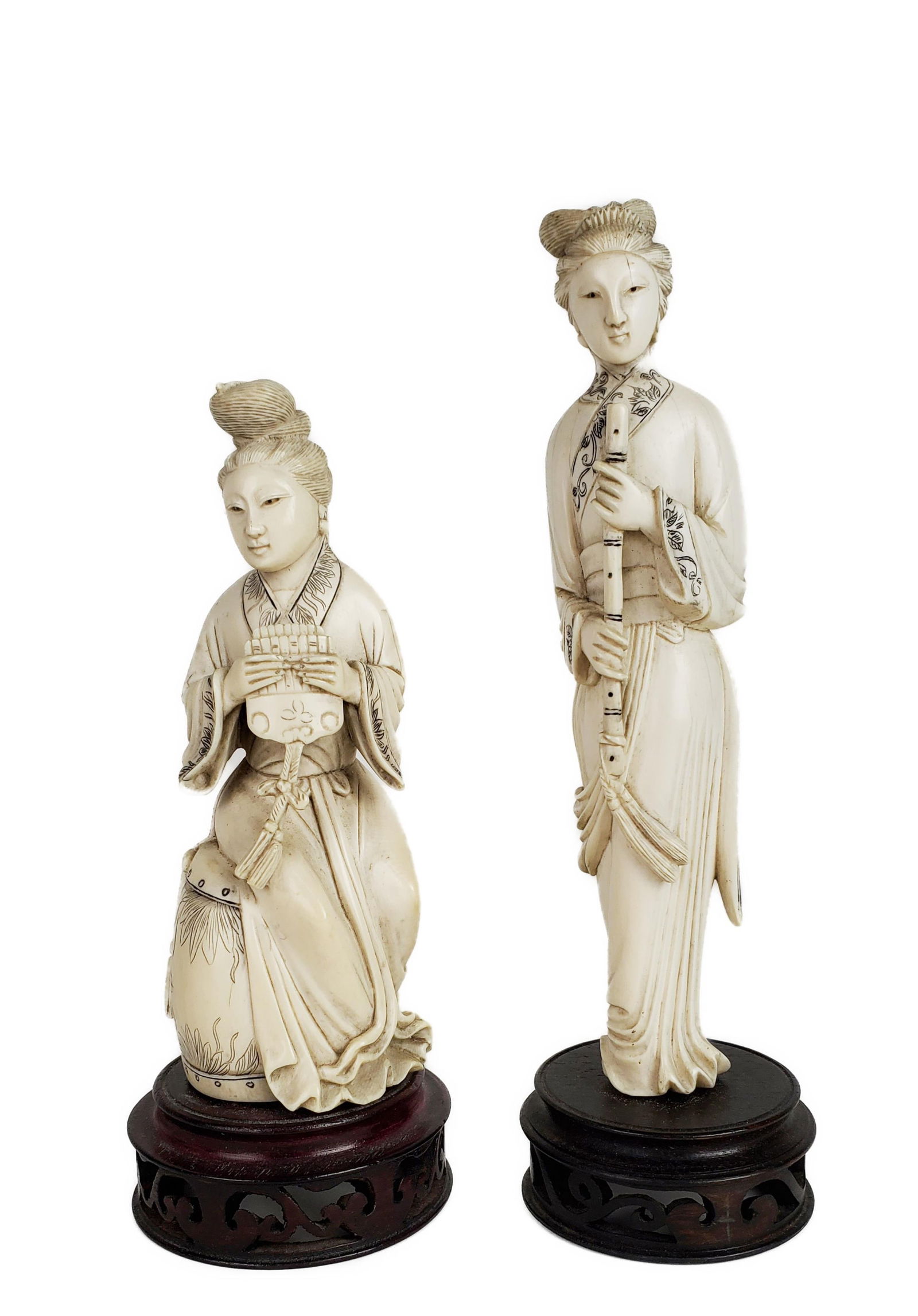 TWO CHINESE CARVED FIGURES OF