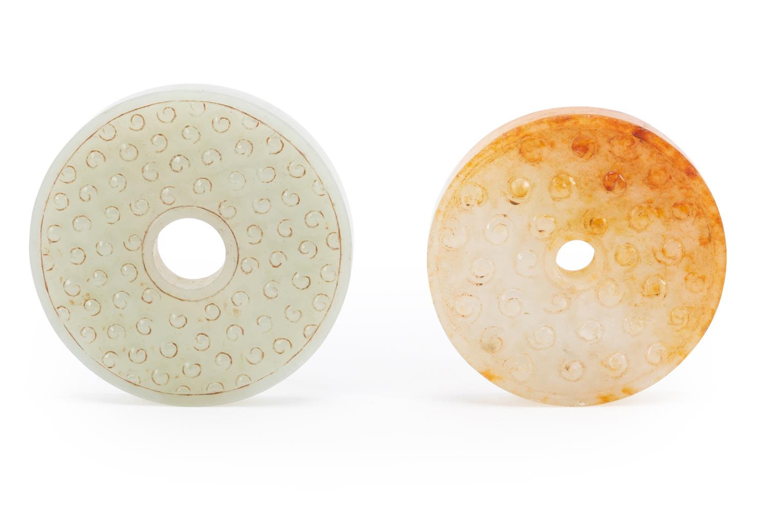 TWO CHINESE CARVED JADE BI DISCS