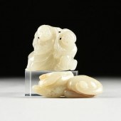 TWO CHINESE CELADON JADE CARVI