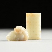 TWO CHINESE CELADON JADE CARVI
