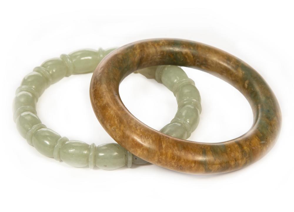 TWO CHINESE GREEN JADE BANGLESTwo