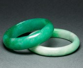 TWO CHINESE GREEN JADEITE BANG