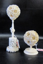TWO CHINESE IVORY CARVED BALLS