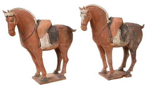 TWO CHINESE POTTERY HORSES WITH