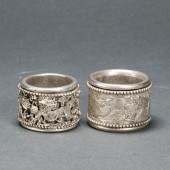 TWO CHINESE SILVER ARCHER'S RI