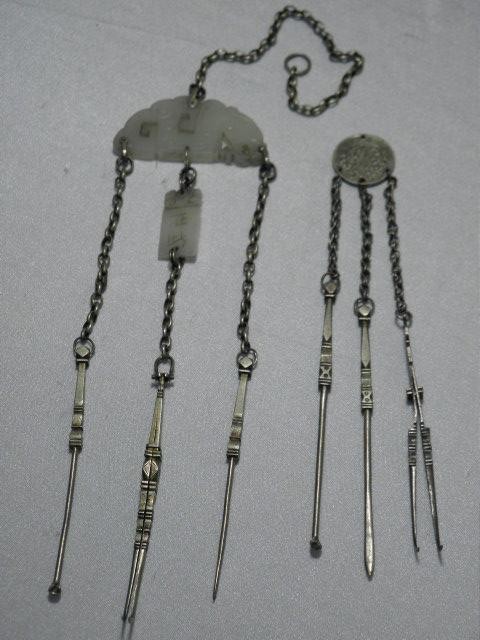 Two Chinese silver metal opium tool