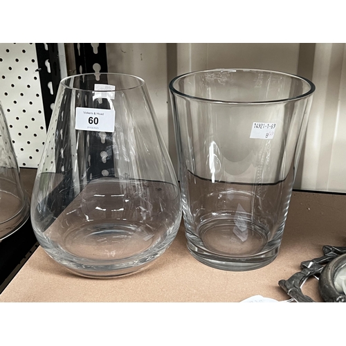 Two clear glass vases, approx