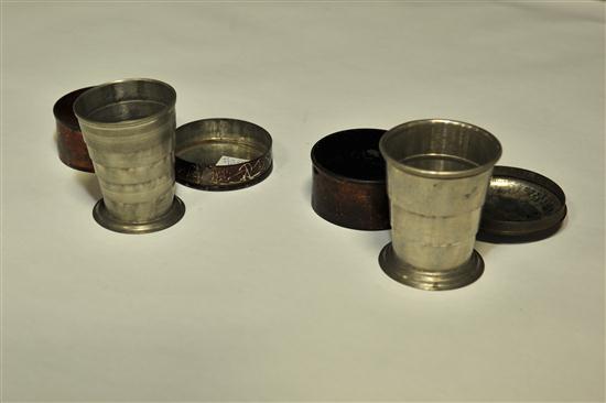 TWO COLLAPSIBLE DRINKING CUPS.