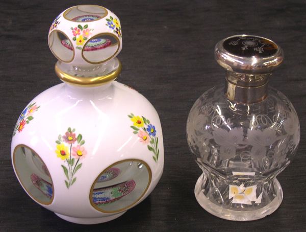 Two Cologne Bottles,  consisting of